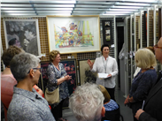 A last photo of Mary Griffith in the very popular vaults showing her choice of paintings from the collection.